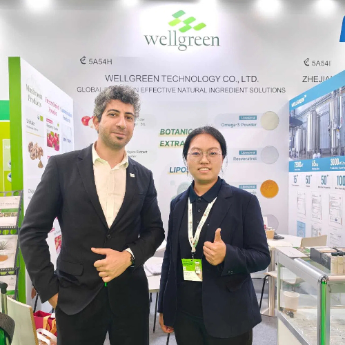 Wellgreen smiling with client partner Wellgreen smiling with client partner